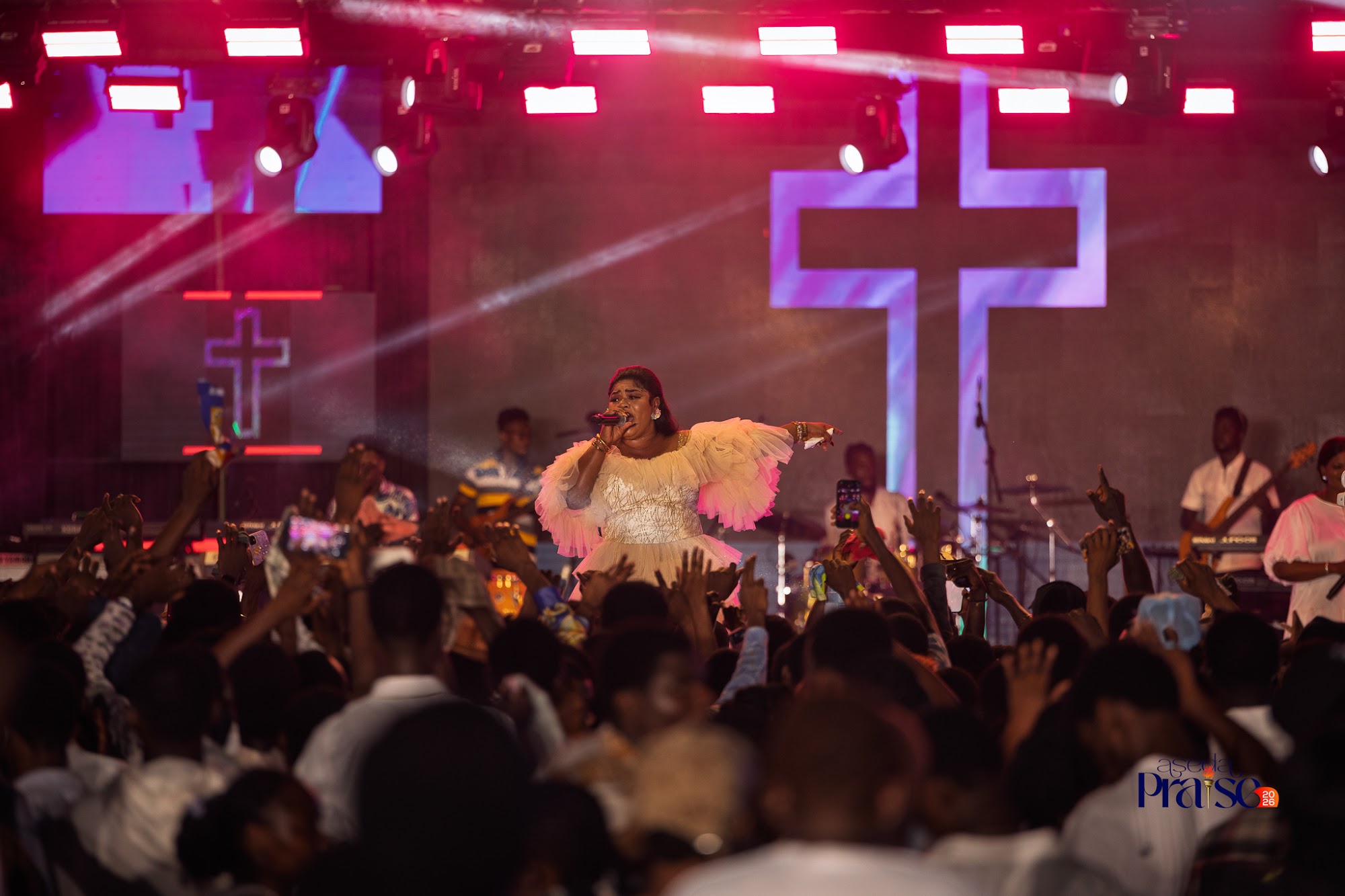 Obaapa Christy performing live on stage at Aseda Praise